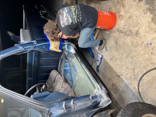 Vehicle body and rust repair replacing corroded metal panels for state inspection