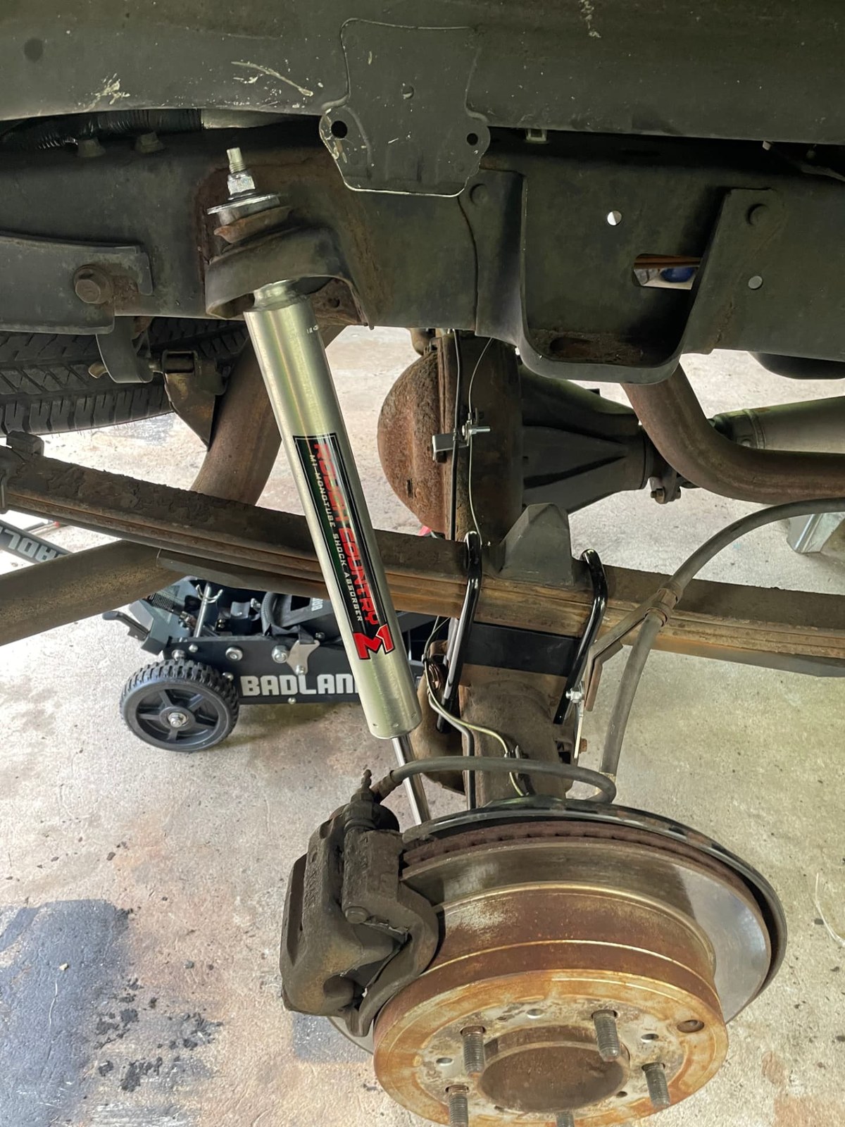 Rough Country N3 shock absorber installed on a truck's front axle