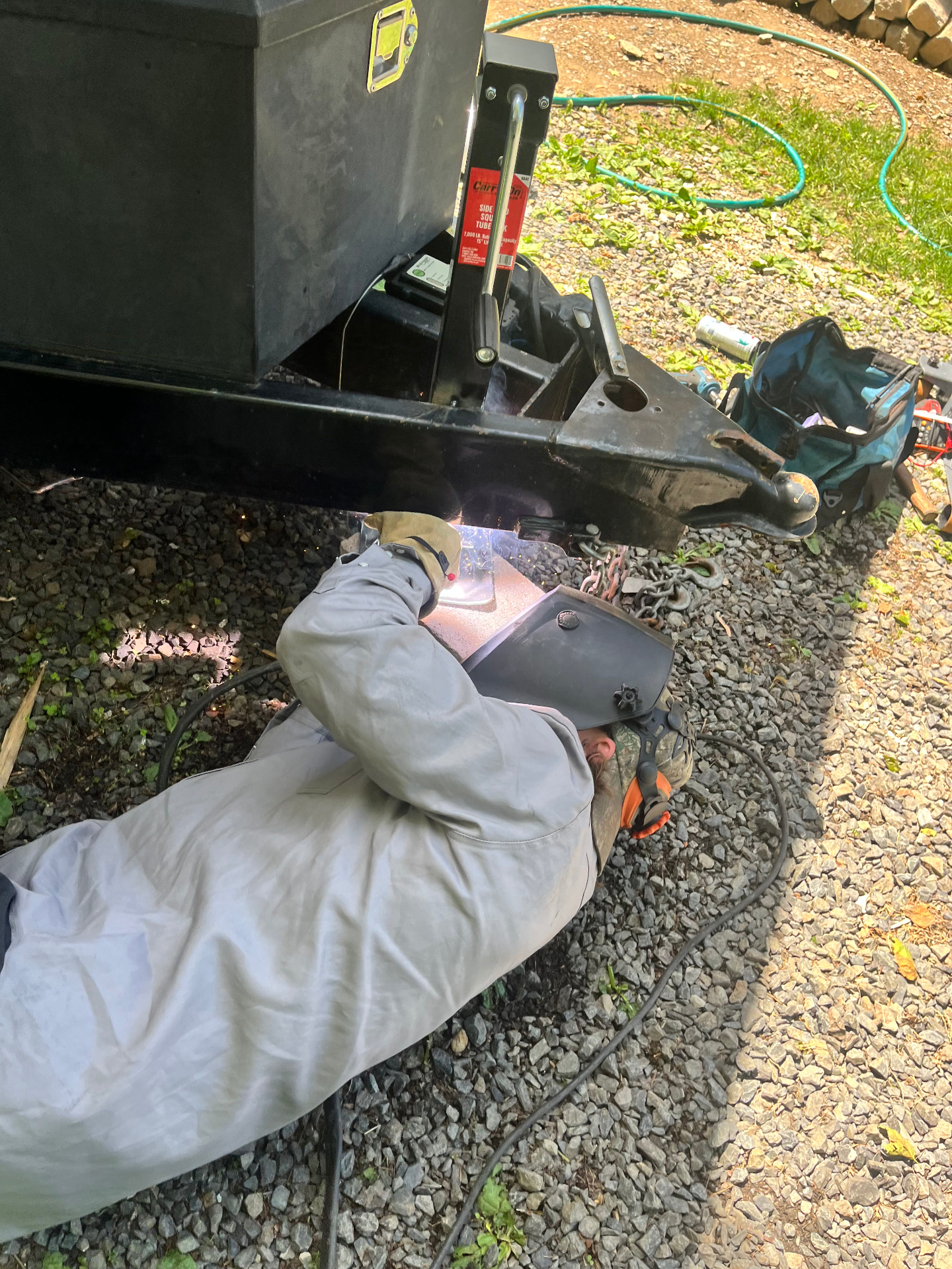 On-site welding repair on a trailer hitch receiver and coupler assembly